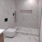 Clean modern washroom in deluxe hotel room in Orai Jalaun Uttar Pradesh